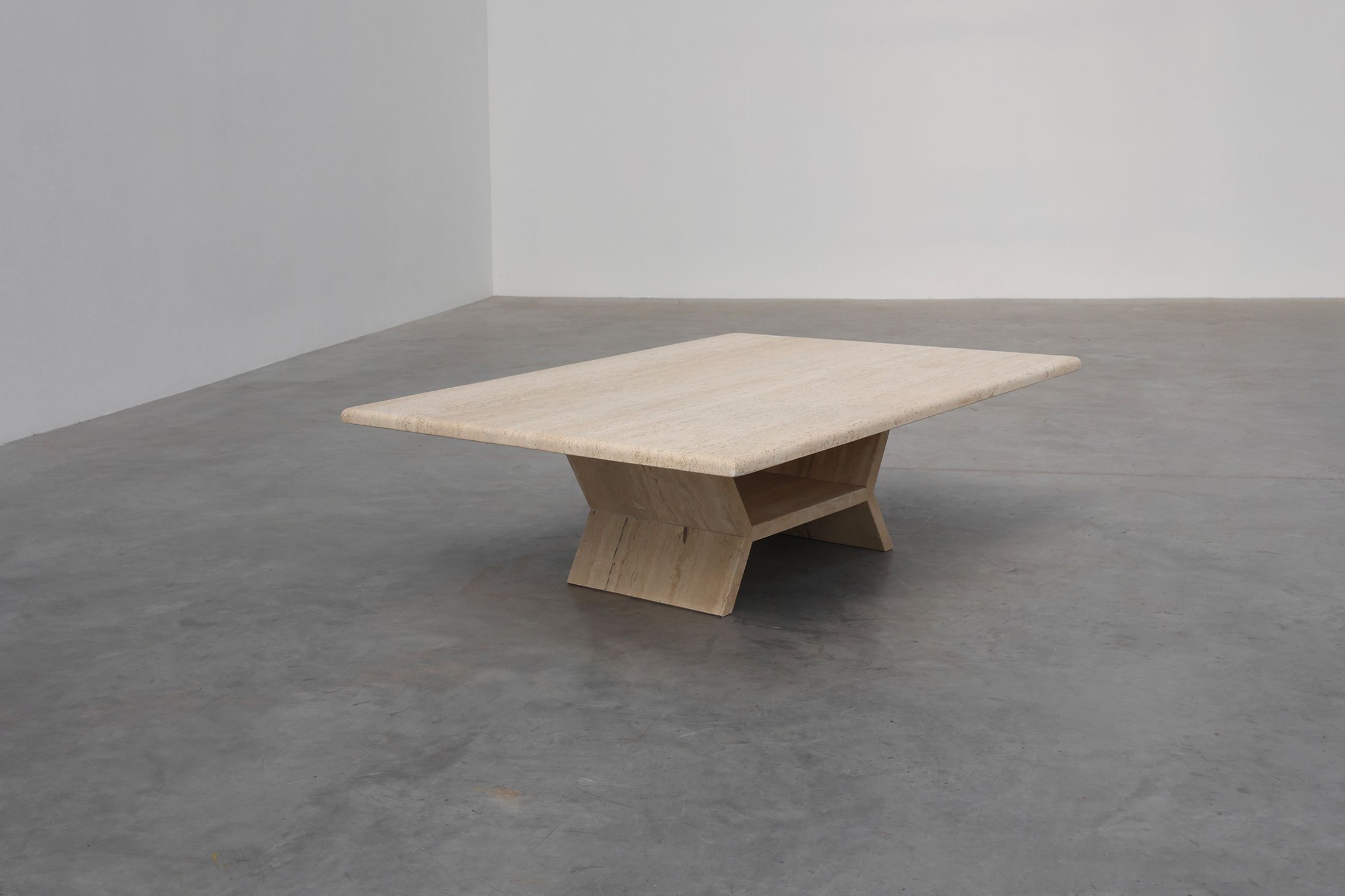 Sculptural geometric rectangular travertine coffee table, Italy 1960sthumbnail